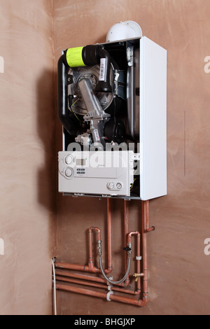 Installation of a new Vaillant ecotech 637 condensing boiler. Stock Photo