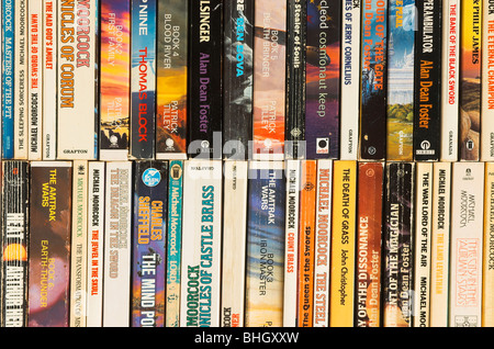 Piles of old second hand science fiction paperback books Stock Photo