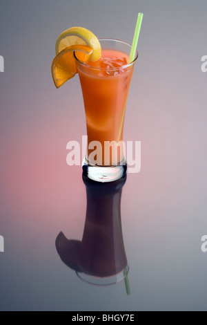 Zombie mixed drink silhouetted on plain background with reflection Stock Photo