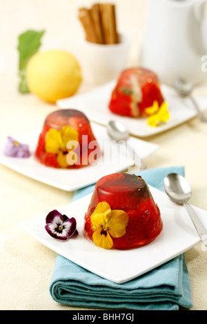 Jelly dessert with flowers and strawberries. Step by step. PA478Y-PA47BJ-PA47C1-PA47CJ Stock Photo