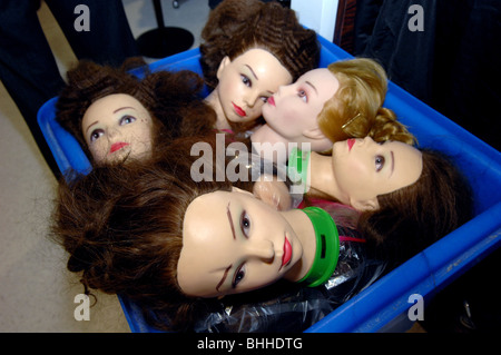 A basket full of hairdresser's dummies. Stock Photo