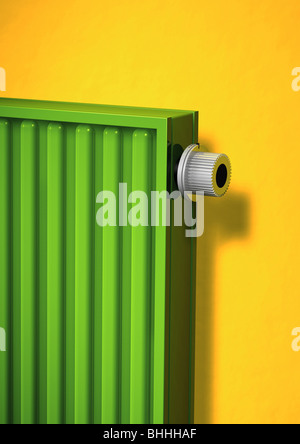 green radiator with themostatic valve - Gruener Heizkoerper mit Thermostatventil Stock Photo