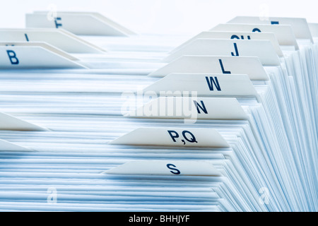 closeup of rolodex cards organized by alphabetical order Stock Photo