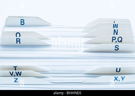 closeup of rolodex cards organized by alphabetical order Stock Photo