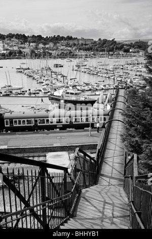 Kingswear Station with Pedestrian Footbridge and River Dart beyond, South Hams, Devon, England, United Kingdom Stock Photo