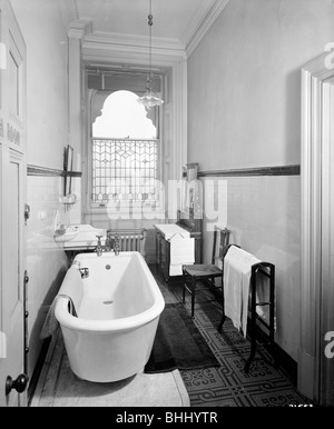 An early bathroom in the Grand Hotel, Northumberland Avenue, London, 1912.  Artist: Bedford Lemere and Company Stock Photo