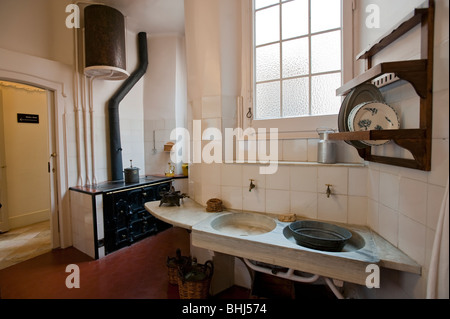 A kitchen in an apartment at Casa Mila in Barcelona, Spain Stock Photo ...