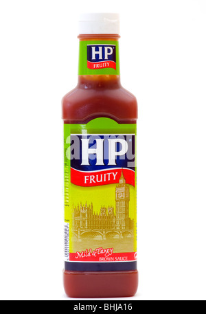 A Bottle Of HP Fruity Brown Sauce Isolated Against A White Background Stock Photo