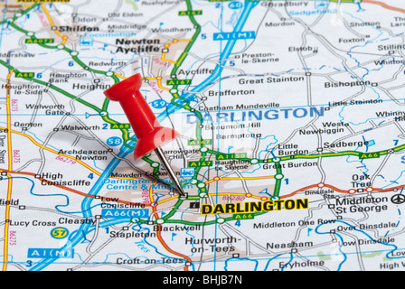 red map pin in road map pointing to city of Darlington Stock Photo