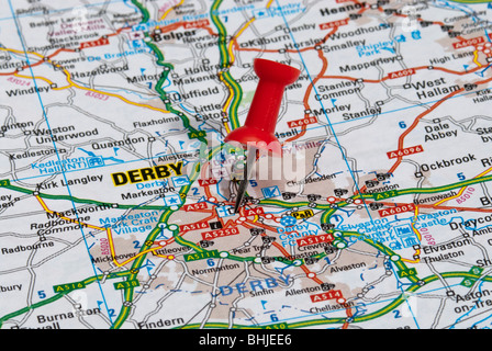 red map pin in road map pointing to city of Derby Stock Photo