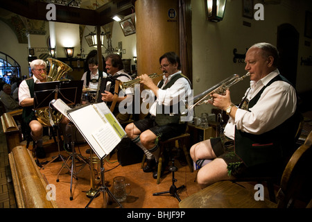 Traditional Bavarian music and atmosphere at the Hofbrauhaus am Platzl. Munich, Germany Stock Photo