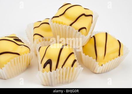 Five Mr Kipling Lemon French Fancies sponge cakes with vanilla topping Stock Photo