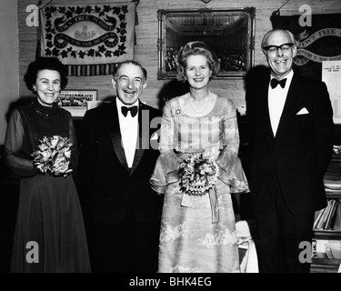 Margaret Thatcher (1925- ), Dennis Thatcher, Dr and Mrs Conway at ladies' night, 1975. Artist: Unknown Stock Photo