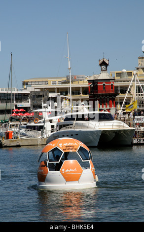 Floating soccer ball on a harbour tour at the V&A waterfront in Cape Town South Africa Stock Photo