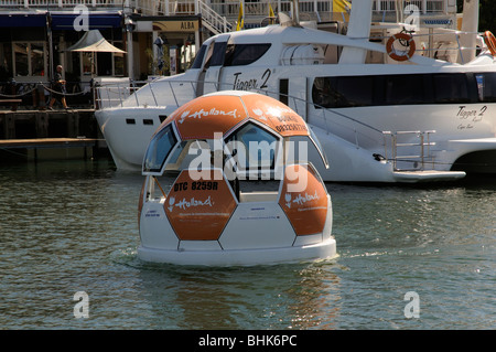 Floating soccer ball on a harbour tour at the V&A waterfront in Cape Town South Africa Stock Photo