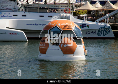 Floating soccer ball on a harbour tour at the V&A waterfront in Cape Town South Africa Stock Photo