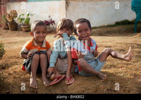 Cute young kids all excited about being in front of a camera Stock Photo