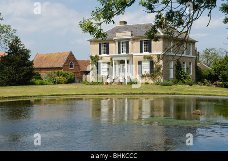 Preston Court at Preston, near Canterbury, Kent, United Kingdom. Beautiful house sitting in it's own grounds with a large lake Stock Photo