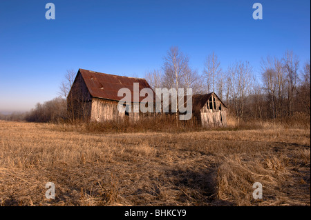 Old abandoned farm buildings near St-Joseph-du-Lac, Quebec, Canada Stock Photo