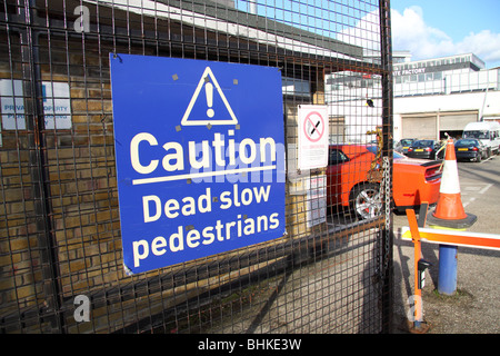 A humorous notice on the gate of a private car park Stock Photo