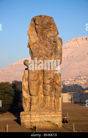 The west Colossus of Memnon, statue of Amenhotep III Stock Photo