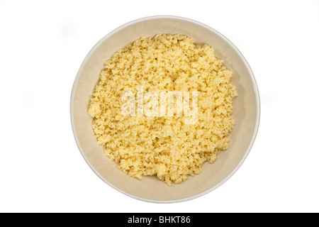 White bowl full of cooked Couscous Stock Photo