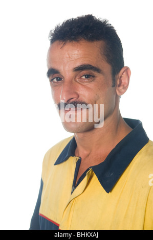 Portrait of an Arabic Mechanic looking at the camera against a white background Stock Photo