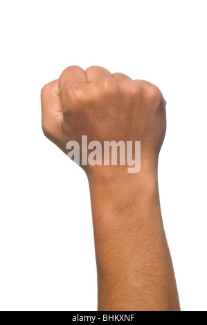 Close up of a clinched hand against a white background Stock Photo