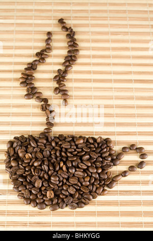 A cup of hot coffee made out of coffee beans Stock Photo