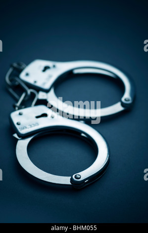 Metal handcuffs Stock Photo