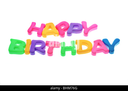 Alphabet blocks arranged in the words 'Happy Birthday' isolated on white backgound Stock Photo