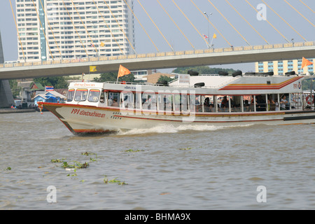 Boat on the Chao Phaya river in Bangkok, Thailand. Stock Photo