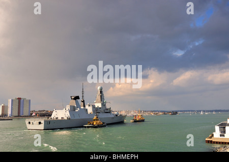 HMS Dauntless entering Portsmouth Harbour Stock Photo