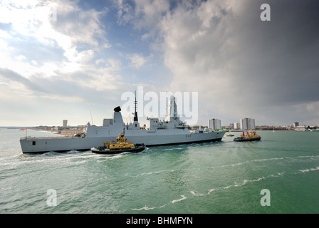 HMS Dauntless entering Portsmouth Harbour Stock Photo