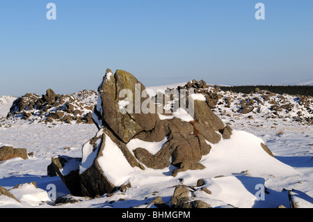 Outcrops of Spotted Dolerite - Bluestones on Carn Menyni n snow Preseli Hills Pembrokeshire Wales Cymru UK GB Stock Photo