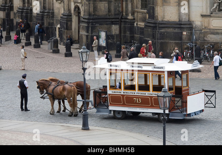 A Horse Drawn tram in front of the Cathedral, Dresden, Germany Stock Photo