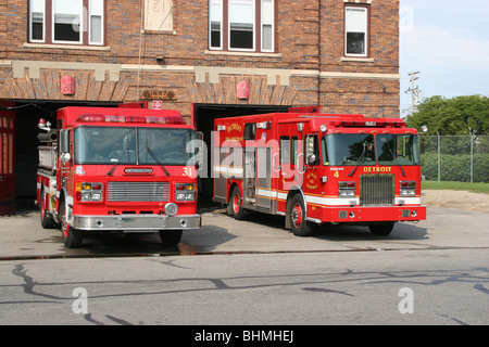 Engine Co # 31 and Squad Co # 4 parked in front of firehouse Detroit MI  USA, by Dembinsky Photo Assoc Stock Photo