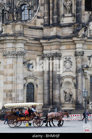 A Horse Drawn tram in front of the Cathedral, Dresden, Germany Stock Photo