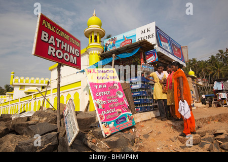 India, Kerala, Kovalam, Samudra Beach, Indian tourists at snack bar and public comfort station Stock Photo