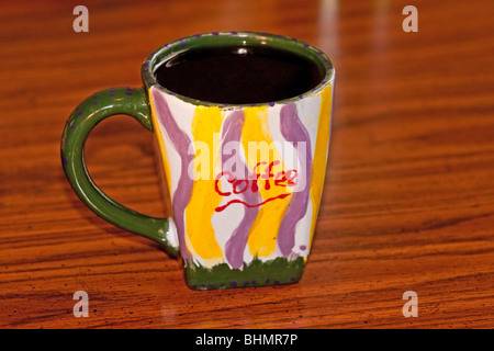 cup of coffee with coffee spelled out on coffee cup Stock Photo