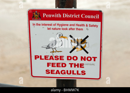 Please do not feed the seagulls sign Penwith District Council Stock Photo