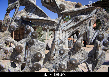 Detail of fossils including belemnites in rock st a fossil processing factory in Morocco, North Africa Stock Photo