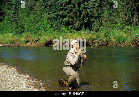 Roger Hutchings the photographer fishing on the Talachulitna River in Alaska Stock Photo