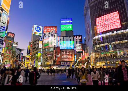 Tokyo Shibuya Crossing, Hachiko Square, Japan, Neon Advertising Billboards. Stock Photo