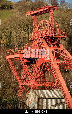 The old Lewis Merthyr pit head winding gear at the Rhondda Heritage Park coal mining museum Trehafod Rhondda Valley South Wales Stock Photo
