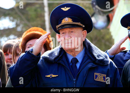 Soviet/Russian cosmonaut Alexey Leonov saluting whilst listening to the national anthem at Novoselovo, Russia Stock Photo