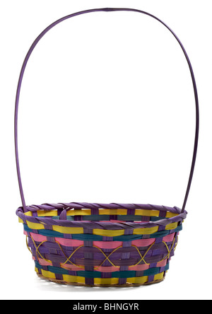 Wicker easter basket on white background Stock Photo