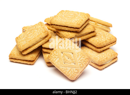 Studio shot of a pile of Custard Cream biscuits cut out isolated on white background Stock Photo