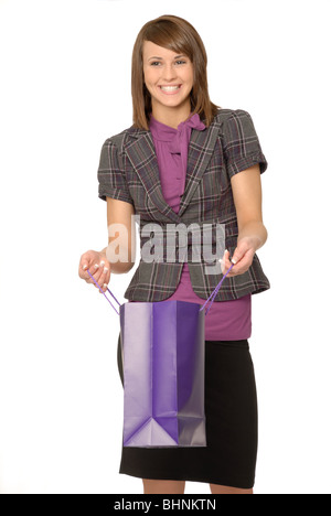 Attractive young woman with a shopping bag. Stock Photo