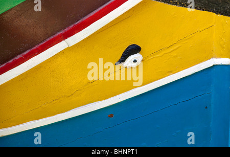 Detail from a traditional carvel built fishing boat or luzzu in harbour in Malta Stock Photo